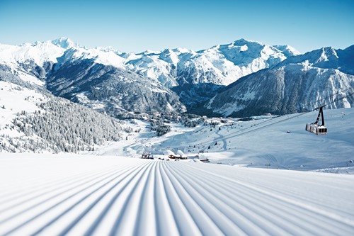 Courchevel ski weekends fresh piste basher tracks mountain valley snow