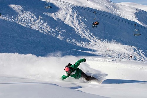 Sonnenkopf boarder powder day chairlift